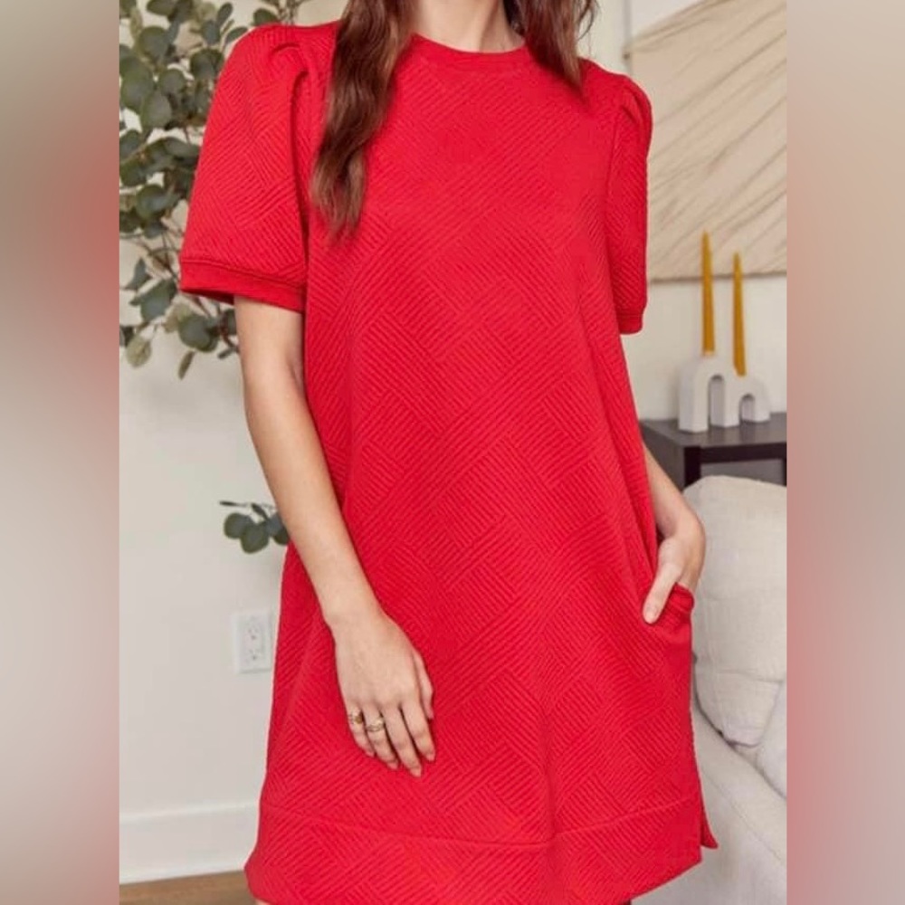 Red textured dress with pockets.